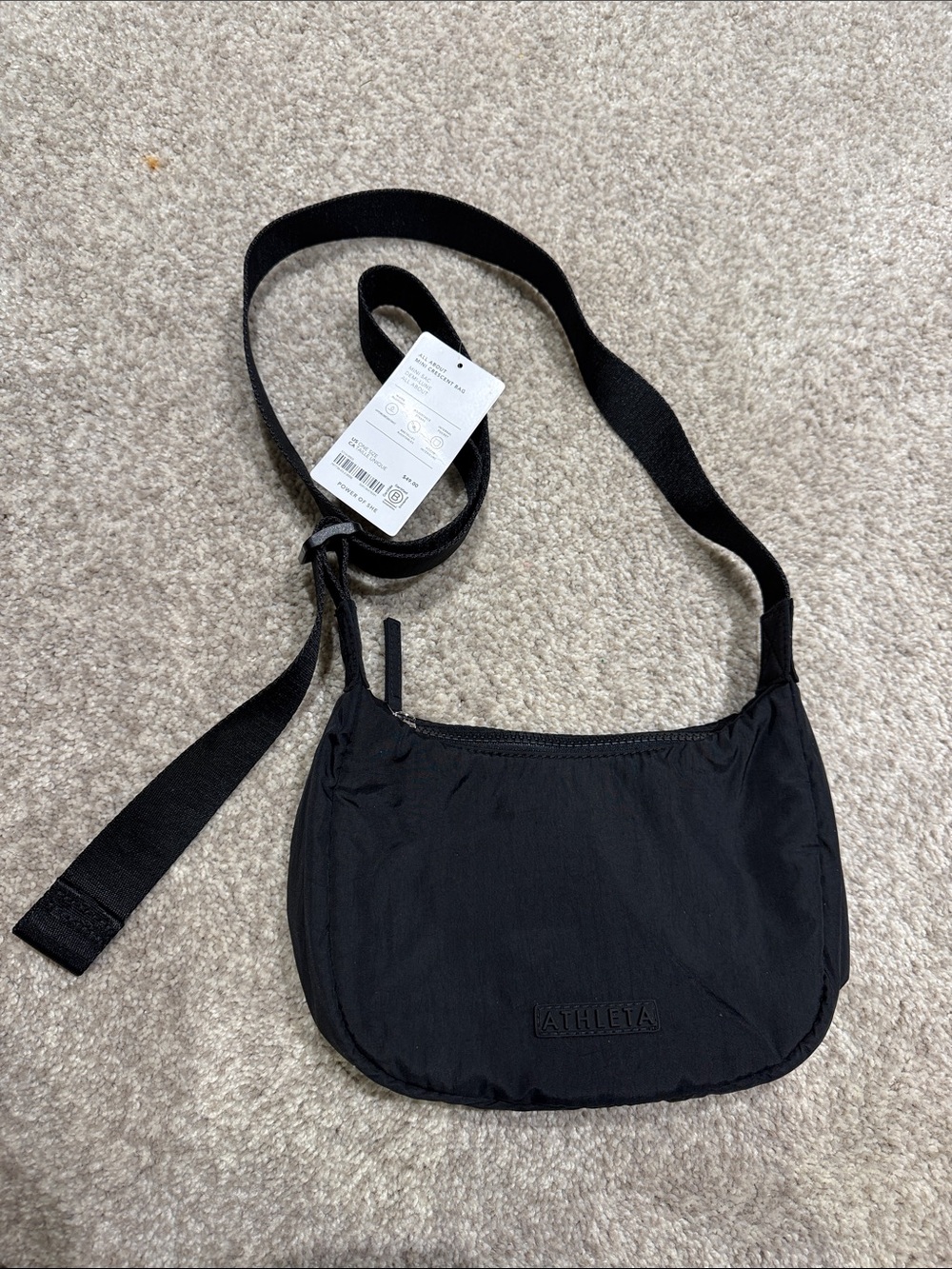 Athleta Black mini crescent bag